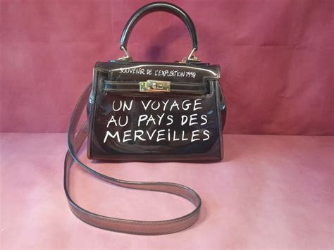 un voyage au pays des merveilles tas hermes